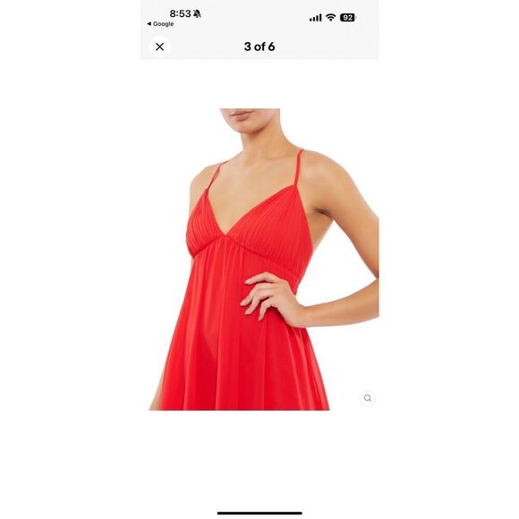 Spaghetti strap chiffon baby doll dress with a v-neckline, crisscross back, and - Picture 3 of 10